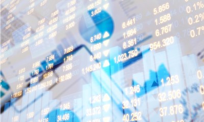 Close-up image of an office desk and financial documents