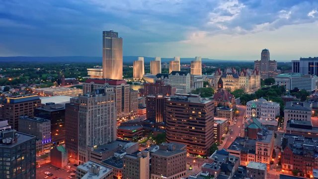 Drone footage of Albany, New York downtown at dusk, with rotating camera motion. Albany is the capital city of the U.S. state of New York and the county seat of Albany County