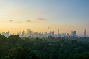Fototapeta na wymiar Majestic sunrise over downtown Kuala Lumpur (KL). KL is the capital of Malaysia. 