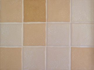 beige background tile on the kitchen wall