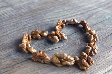 brown heart of walnut on a wooden oak board