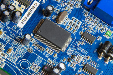 blue computer video board with a processor, microcontroller, smd circuit
