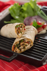 TORTILLA CHICKEN ROLL WRAP ON PLATE 