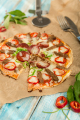 flat tortilla gourmet pizza chilli and on paper