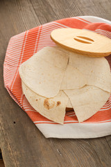 Lavash, tortilla, lavaş, flat and thin bread on table 