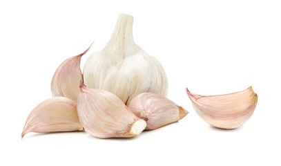 Collection of raw garlic - head and segments isolated on a white background in close-up