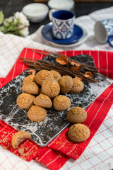 Homemade cookies on wooden table with small coffee cups, turkish coffee , gourmet cookies