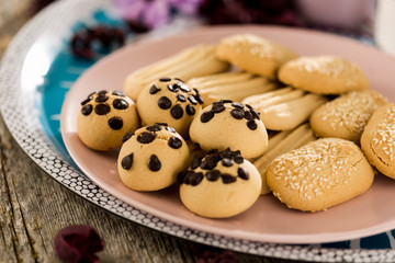 Homemade cookies on wooden table with small coffee cups, turkish coffee , gourmet cookies