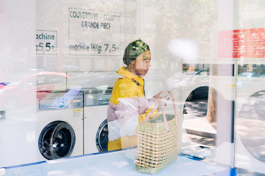 woman at the laundromat