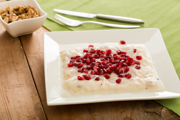 Traditional milky dessert Gullac, usually make in Ramadan with Gullac pomegranate seeds
