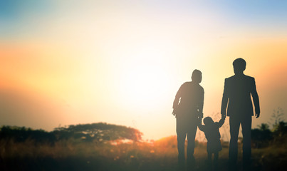 Fototapeta na wymiar Global Day of Parents concept:   Family at sunrise background