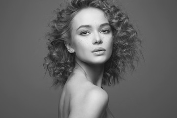 frizzle hair Beautiful woman. black and white portrait