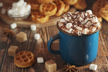 A mug with hot chocolate with marshmallow	