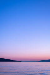 Naklejka na ściany i meble Sea and sky after sunset on the island of Cres