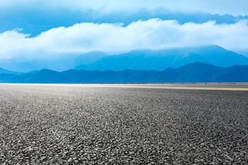 Empty asphalt road and beautiful mountains with clouds sea nature landscape