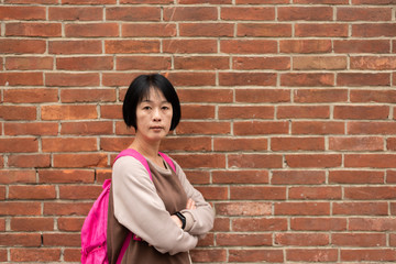 Asian traveling woman with bag