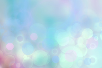 Abstract blue pastel bokeh background texture with bright soft color circles. Space for your text.