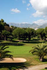 View across the Rio Real Golf Club with mountains to the rear, Marbella, Spain.