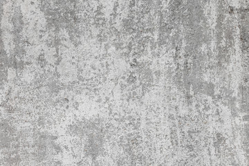 The texture of the old grey concrete wall with scratches, cracks, dust, crevices, roughness, stucco. Can be used as a poster or background for design