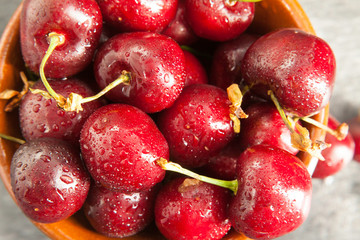 close-up red cherry bowl from above