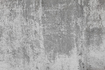The texture of old concrete wall for background with a concrete splash on the wall 