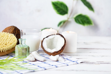 Relax and spa theme. Coconut, coconut oil, milk, candles, massage brush