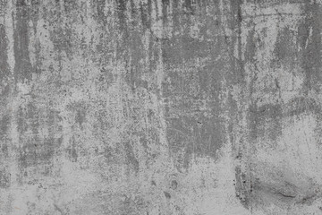The texture of old concrete wall for background with a concrete splash on the wall 