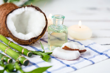 Relax and spa theme. Coconut, coconut oil, bamboo, candles, massage brush