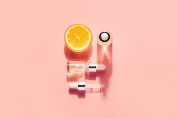 Serum with vitamin C, concept design. Beauty therapy, body care. Minimalism Flat lay.