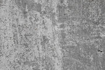 The texture of old concrete wall for background with a concrete splash on the wall 