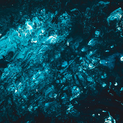 Abstract art texture background. Rubble ice under water design. Beautiful teal blue and white paint splash with marbled effect.