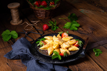 Kopytka - polish potato dumpling with strawberries