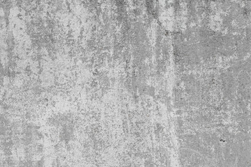 The texture of old concrete wall for background with a concrete splash on the wall 