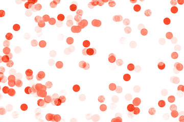 Bright coral confetti isolated on white background.