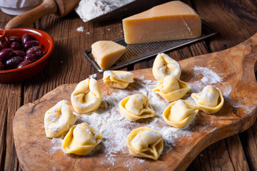 Delicious tortellini di formaggio with cheese and pepper filling