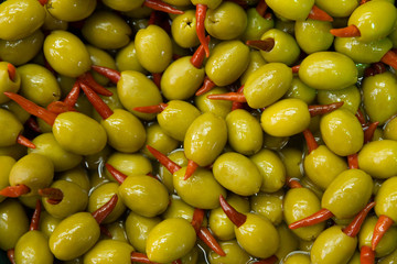 Fresh homemade olives filled with hot red pepper