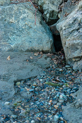 rocks stones and pebbles on a sandy beach