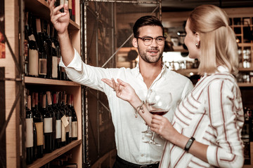 Handsome brunette man talking to his partner