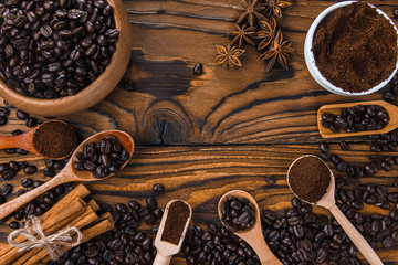 Breakfast menu food frame with a copy space. Coffee, croissants, oatmeal cookies, chocolate, cinnamons, macaroons on the wooden table