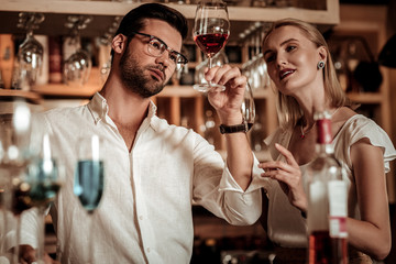 Attentive young man being deep in thoughts
