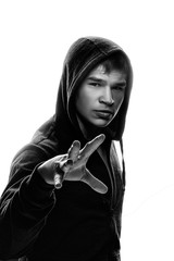Hoodlum young man in black hooded sweatshirt invisible
