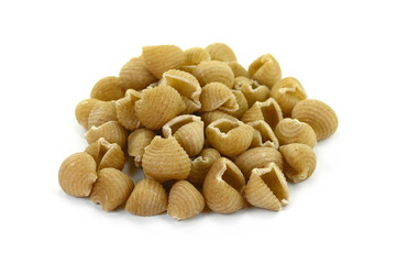 Wholemeal pasta on a white background 