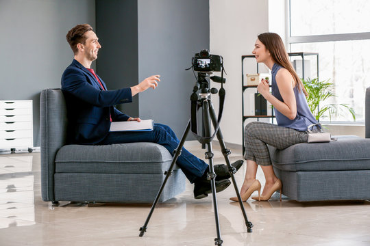 Human resources manager interviewing woman in office