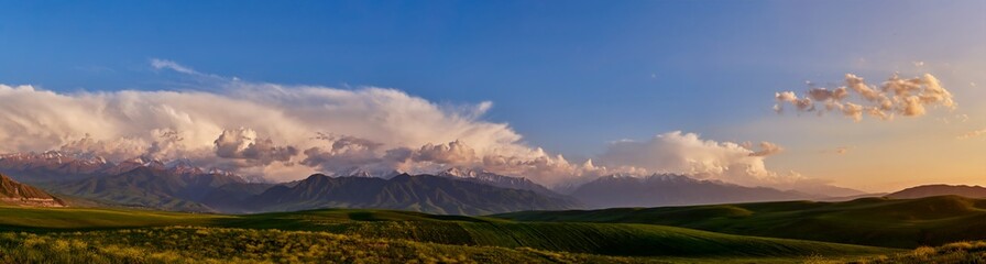 Panorama of a mountain valley in summer. Fabulous sunset in the mountains, amazing nature, summer in the mountains. Travel and camping, tourism