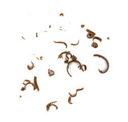 Obraz premium Grated chocolate. Heap of ground chocolate isolated on white background with clipping path, closeup.