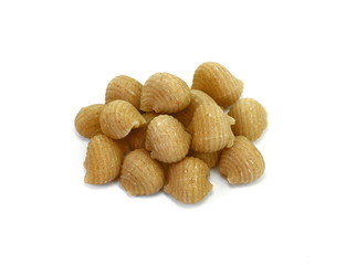 Wholemeal pasta on a white background 
