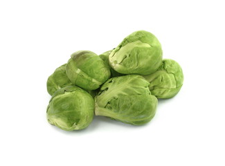 Fototapeta premium a pile of Brussels sprouts on a white background.