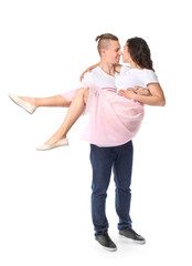 Adorable loving couple on white background