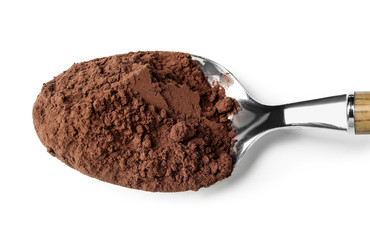 Spoon with cocoa powder on white background