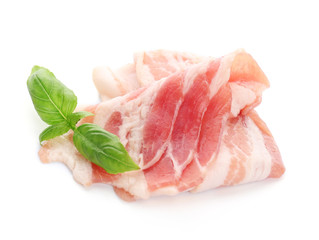 Raw bacon strips on white background